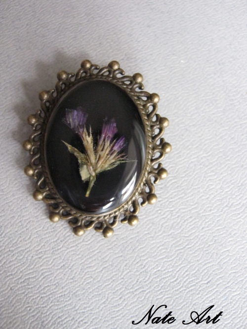 Брошь овальная