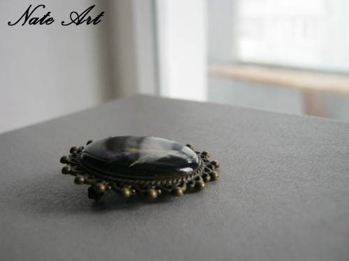 Брошь овальная