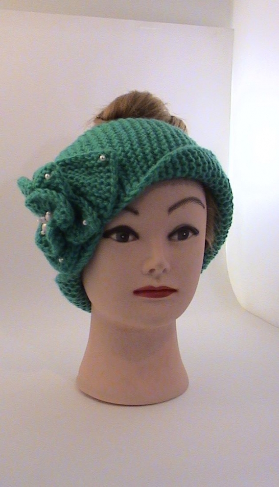 Повязка на голову бирюзовогоцвета вязаная с цветком