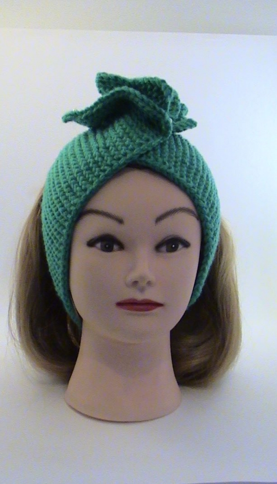 Повязка на голову бирюзовогоцвета вязаная с цветком