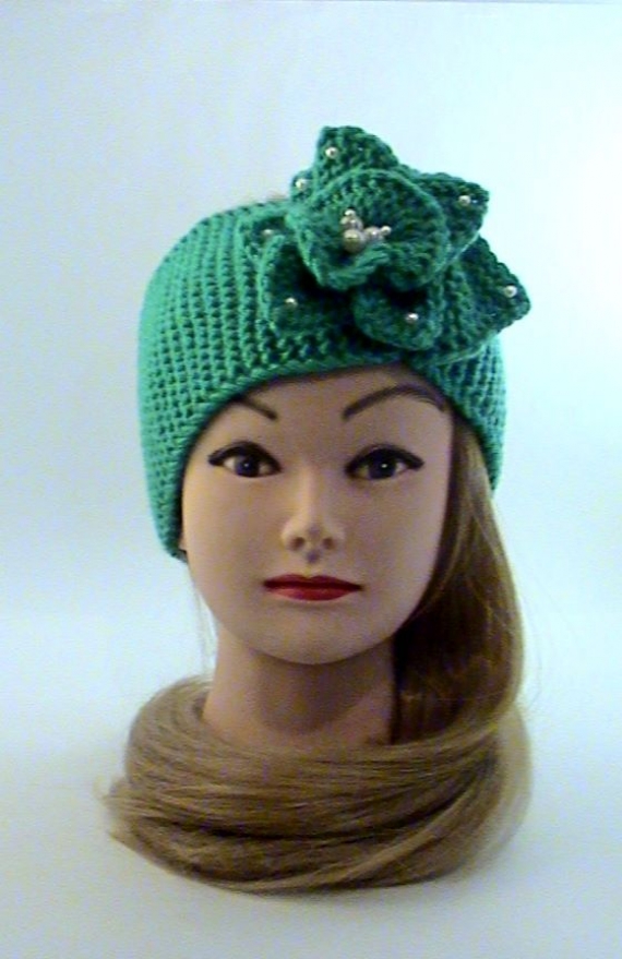 Повязка на голову бирюзовогоцвета вязаная с цветком