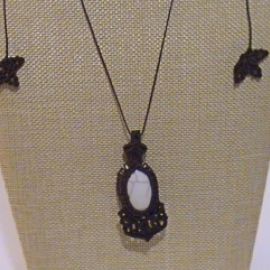 Кулон "Солнечное затмение" из Агата, плетеный в технике макраме