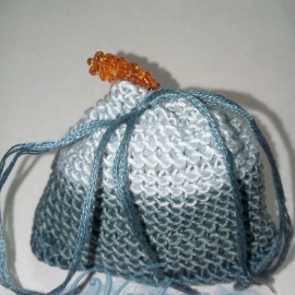 Рыжий кот в мешке.