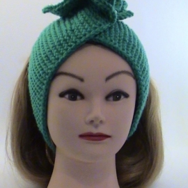 Повязка на голову бирюзовогоцвета вязаная с цветком