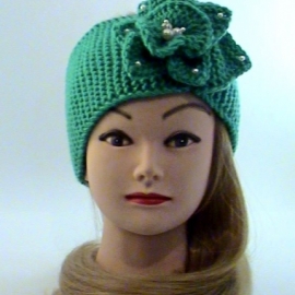 Повязка на голову бирюзовогоцвета вязаная с цветком